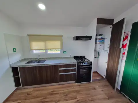 Hermosas cabañas dos ambientes, en planta baja, con entrada pasante de autos y patio.