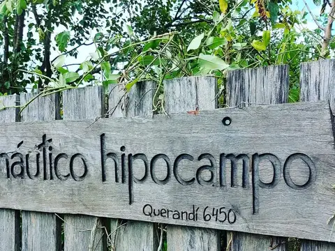 Lote en tierra y agua para casa flotante