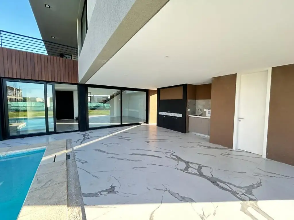 Casa en venta de 4 Ambientes con galería y piscina en el Exclusivo Greenville Polo & Resort  - Foto 14