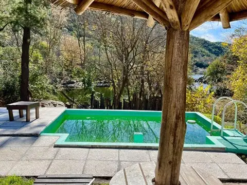 Casa con bajada al rio