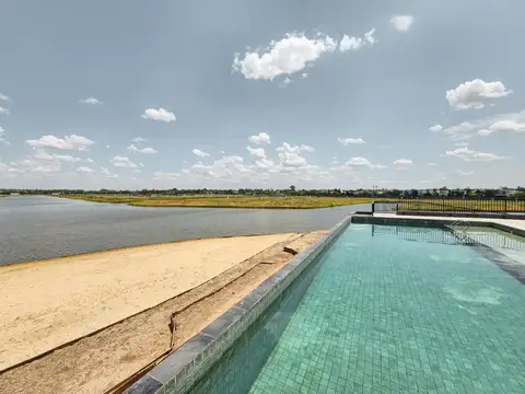 Terreno de 502m² con amenities y lago en Funes Lakes