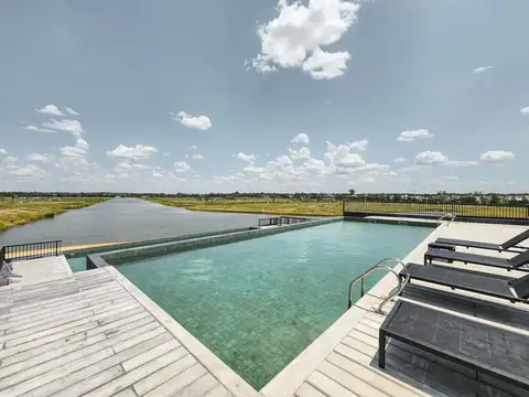 Terreno de 502m² con amenities y lago en Funes Lakes
