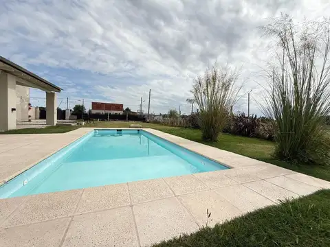 LOTE CON QUINCHO Y PILETA