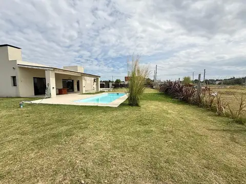 LOTE CON QUINCHO Y PILETA