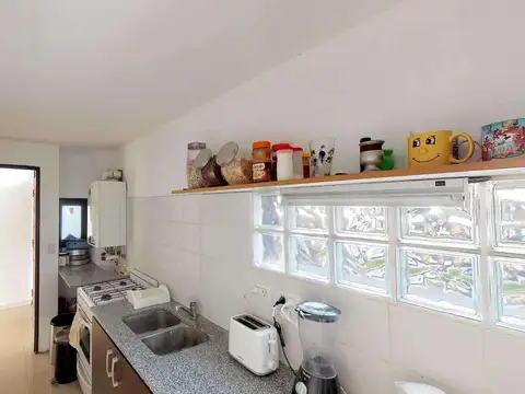 Casa 2 ambientes con 2 baños