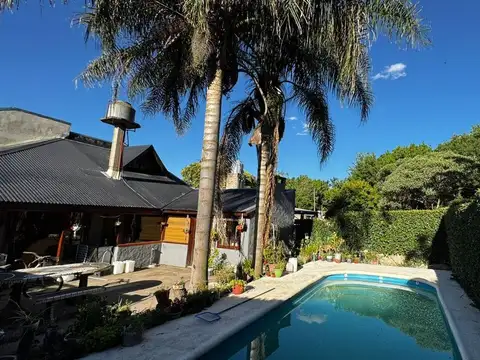 CASA 4 AMBIENTES VENTA PILETA LOCAL Y GARAJE
