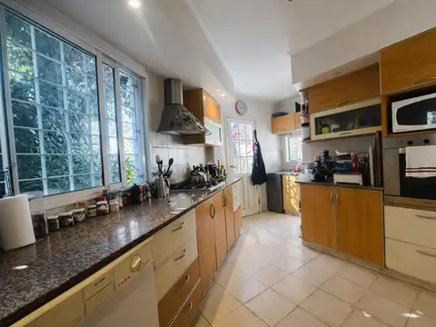 Casa de cuatro ambientes con quincho