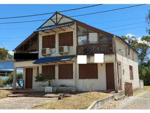 Av. Palafitos unidad 002, al lado de la comisaría 100