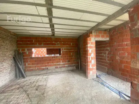 Terreno y construcción a terminar