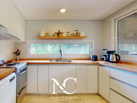 Casa en venta en Costa Esmeralda con fondo libre arbolado