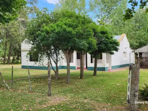 Campo sobre ruta 41, con chalet de dos dormitorios
