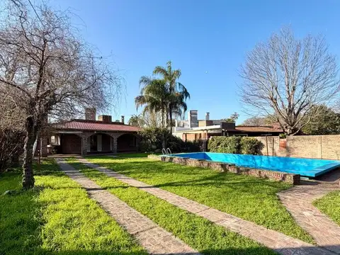 Casa quinta en entorno residencial