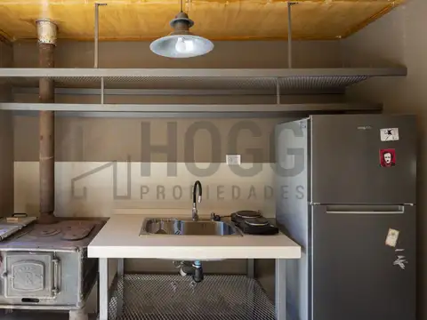 Casa Duggan - diseño industrial tipo loft con gran jardin