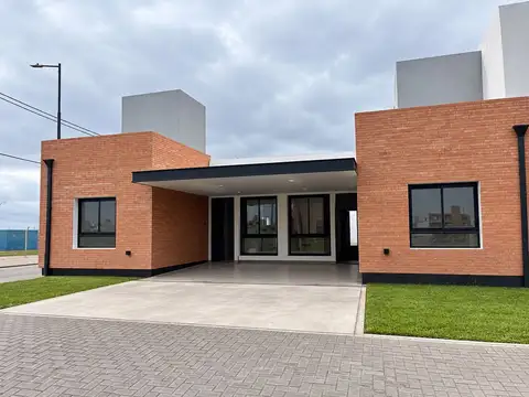 DUPLEX PLANTA BAJA EN PAMPAS DE MANANTIALES 2 DORM