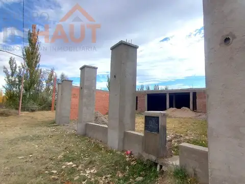 Terreno con mejoras