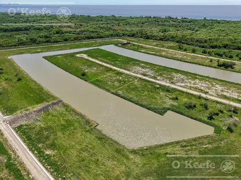 Lote doble de 2067 metros con fondo al agua, en venta en el Canal Ka'An de Puerto Nizuc, G. Hudson
