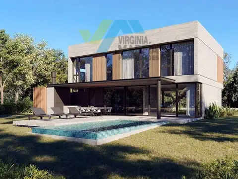 Casa en dos plantas con hormigon visto a la laguna en Riberas Puertos del Lago