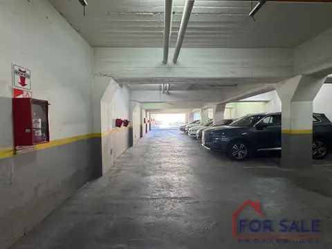 Cochera Fija Descubierta en Edificio – Portón Automático