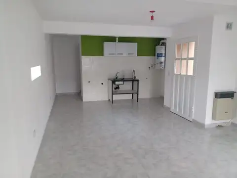 Conjunto de departamentos y locales comerciales