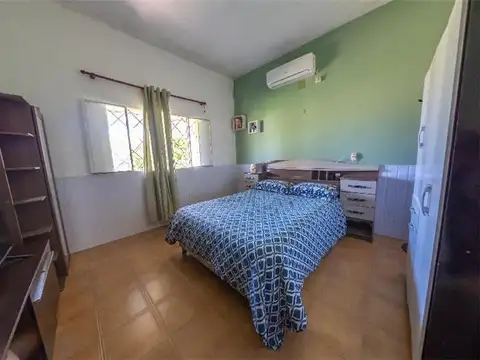 2 Dormitorios, sobre amplia superficie de 607m²