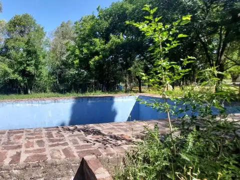 Lote con casa a refaccionar cañuelas