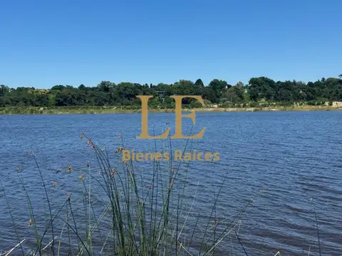 VENTA LOTE AL RIO CON AMARRA