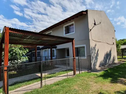 Tres ambientes con parque y cochera