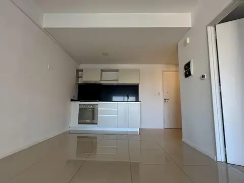 2 Ambientes. Cochera. Piso Alto. Muy Luminoso