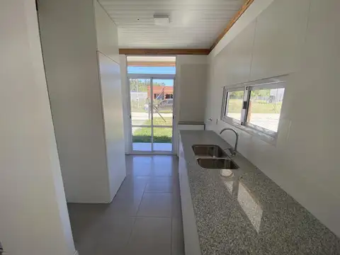 Casa a estrenar 2 dormi en barrio cerrado Garden sobre ruta 36 altura Arturo Segui