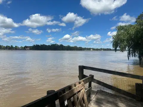 VENTA LOTE C/CASA PARANÁ DE LAS PALMAS FTE. PUERTO