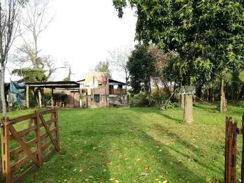 CASA CON GRAN TERRENO FRENTE AL RÍO – PARAJE LOS 2 OMBUES