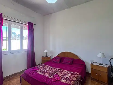 VENTA DE CASA 3 AMBIENTES CON PARQUE.