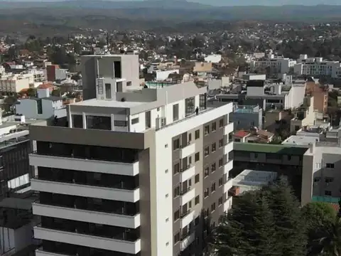EXCELENTE DEPARTAMENTO EN VENTA EN VILLA CARLOS PAZ, A ESTRENAR, 0 KM. 1 DORM CON BALCÓN AL FRENTE.