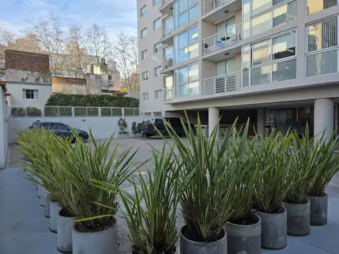 Dpto. 2 amb. con cochera y terraza