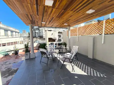 Propiedad en PA de tres dormitorios y amplia terraza, con cochera - Microcentro