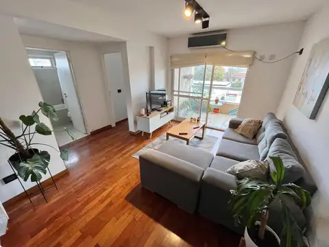 Departamento 2 dormitorios con cochera y amenities