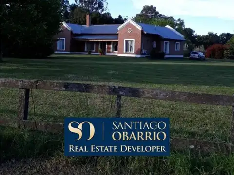  Amplia casa sobre una chacra de 1,8 hectáreas  