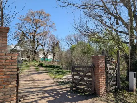 Terreno más casa para inversión