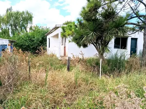 Venta de terreno con construcción  en Pando 