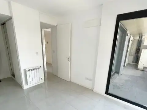UN DORMITORIO + COCHERA + AMENITIES