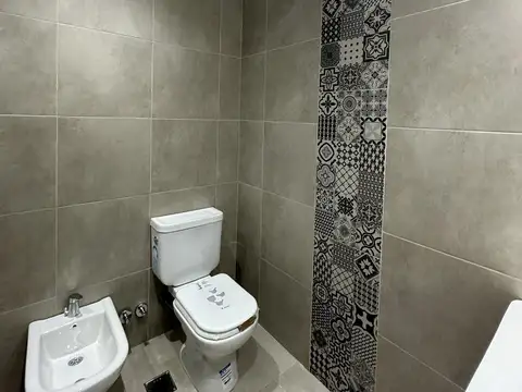 Venta de Departamento 2 ambientes con patio y cochera en Villa Dominico