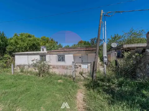 Venta de casa con gran terreno en Barros Blancos