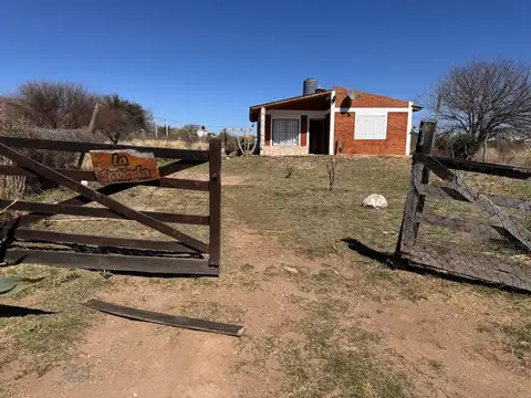 CASA CON CABAÑAS EN VENTA