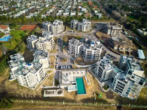 Venta Departamento 2 dormitorios con cochera en  Barrio Cerrado 8 Sauces Funes Amenities