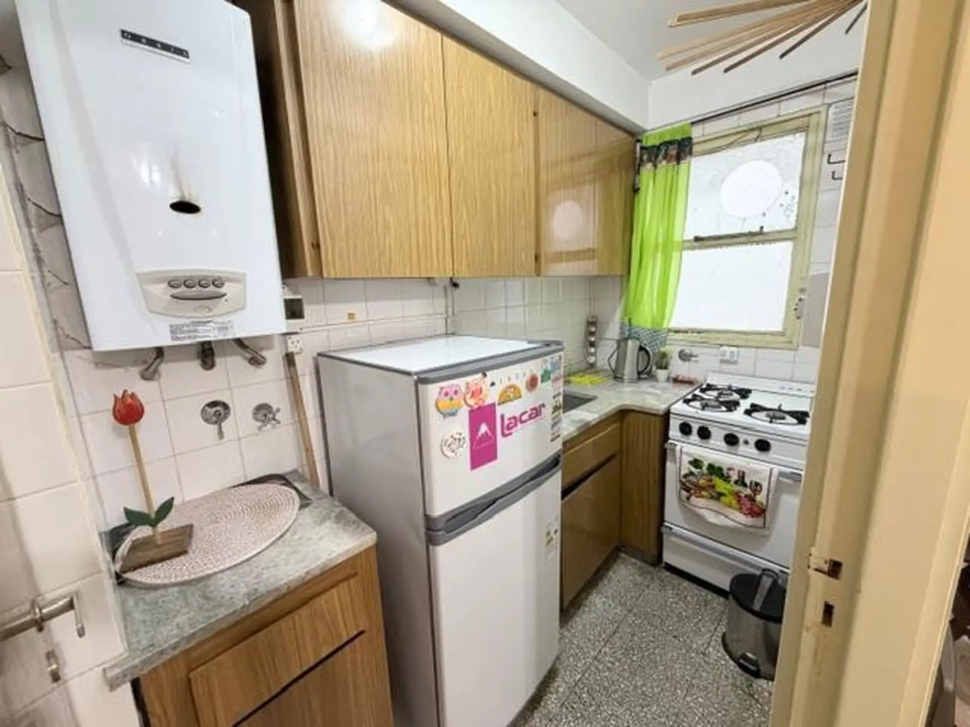 Depto 1 ambiente y medio, 32m² con ascensor — sin cochera