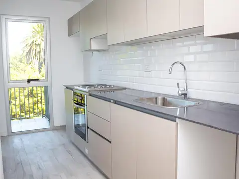 Tigre, excelente 2 ambientes c/cochera adicional, balcon c/parrilla, venta financiada