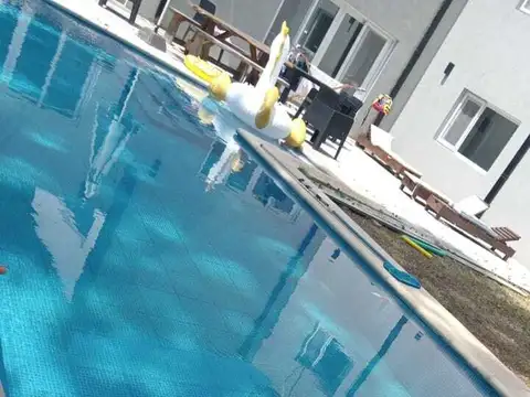 ALQUILER TEMPORARIO CASA  CON PILETA CLIMATIZADA