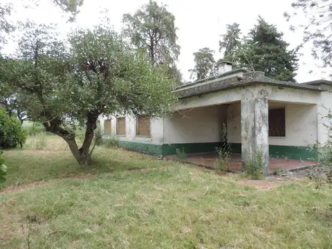 Chacra con casa y galpón, costa con arroyo Valdez