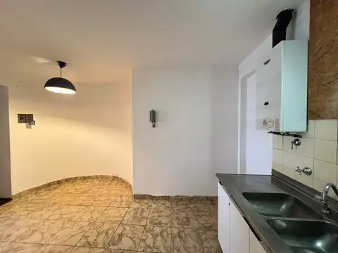 Alquiler Rosario Departamento 2 dormitorios con patio. Planta baja.