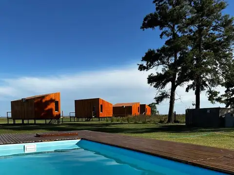 VENTA - COMPLEJO DE CABAÑAS EN MELINCUE FRENTE A LA LAGUNA